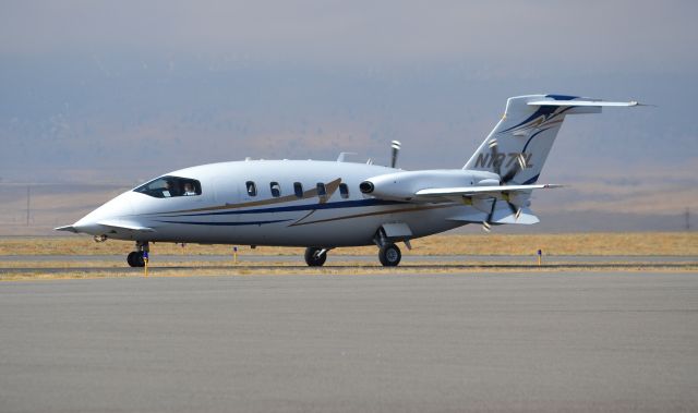 Piaggio P.180 Avanti (N137SL) - P180 taxiing in KBJC for departure.  03/18/2011