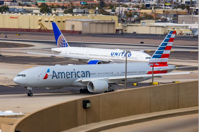 Boeing 777-200 (N779AN) - An American Airlines 777-200 taxiing at PHX on 2/13/23, the busiest day in PHX history, during the Super Bowl rush. Taken with a Canon R7 and Canon EF 100-400 II L lens.