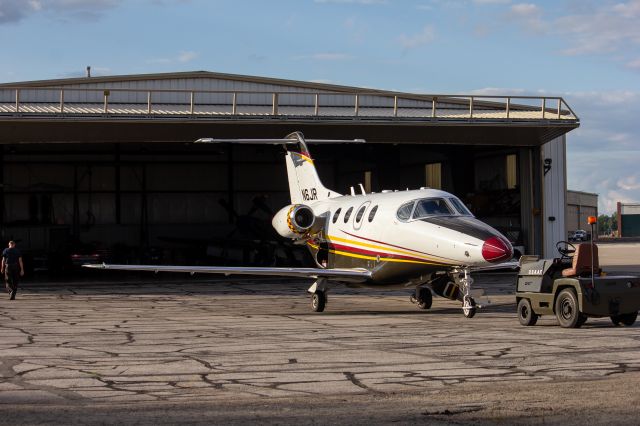 Beechcraft Premier 1 (N6JR) - Jack Roush's Premier 1 sitting outside his hanger with 3 P-51's hidding inside.