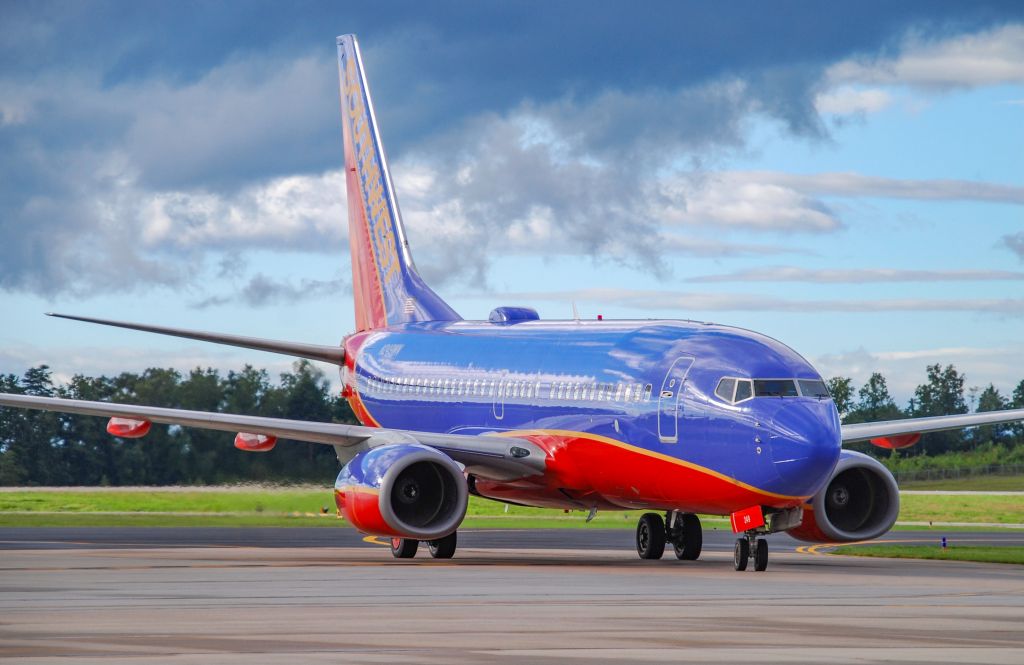 Boeing 737-700 (N249WN) - Landing after being diverted from DEN-CLT for bad weather.  9/1/21.