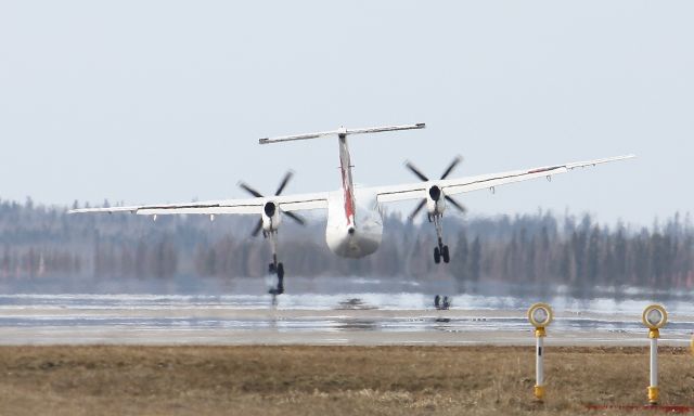 de Havilland Dash 8-100 — - Fighting the x-wind on touchdown