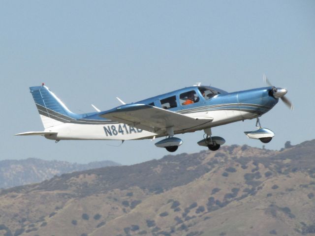 Piper Saratoga (N841AD) - Taking off RWY 8R