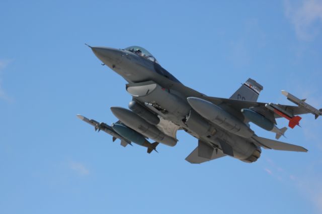 Lockheed F-16 Fighting Falcon — - This F16 from the Colorado National Guard at Buckley AFB was departing runway 14 on its way to bombing practice. It was zipping by me in afterburner at 250+ knots, so I found it difficult to get centered shots.