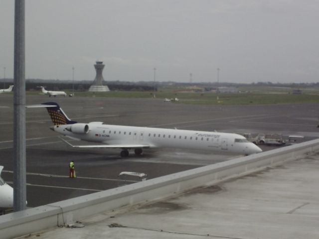 Canadair Regional Jet CRJ-900 (D-ACNK) - Taken from the departure lounge at NCL - 20/04/2014