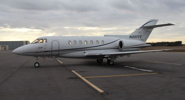 Hawker 1000 (N207TT) - A Hawker 1000 on the ramp at Thomas J. Brumlik Field, Albertville Regional Airport, AL - January 12, 2017. Shot with a Canon T5 in sports mode, using the 18-33mm lens.