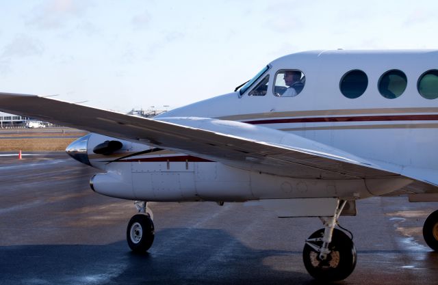 Beechcraft King Air 90 (N700RF) - Taxi out of the (new) Landmark apron