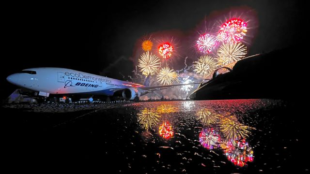 Boeing 777-200 (N861BC) - The conclusion of EAA AirVenture 2022’s Night Show from the wing of a T-38A w/ Boeing’s ecoDemonstrator in the background. 7/27/22. br /br /The aircraft in the background is a 2002 Boeing 777-200(ER), S/N 32336. The aircraft the photo is being taken from is a 1994 Northrop T-38A Talon of the 1st Reconnaissance Wing at Beale AFB, CA. 