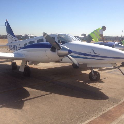 Piper Seneca (EC-HUY) - Examiner is checking the oil & fuel level before starting my ME/IR Renewal flight from Madrid Cuatro Vientos Airport to Salamanca Airport