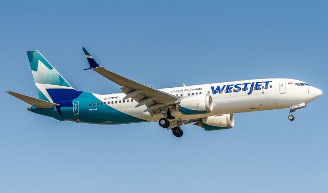 Boeing 737 MAX 8 (C-FNWD) - Westjet 247 arrives home from Halifax. New livery, what do you think?