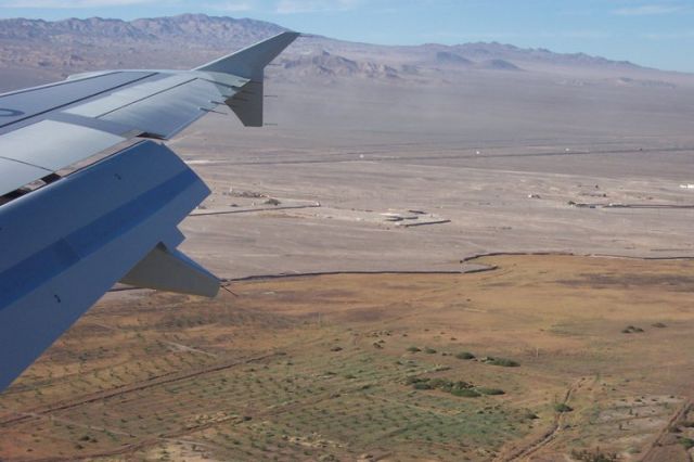 — — - LAN Chile, approaching Calama airport in the "norte chico" (small North) of Chile.