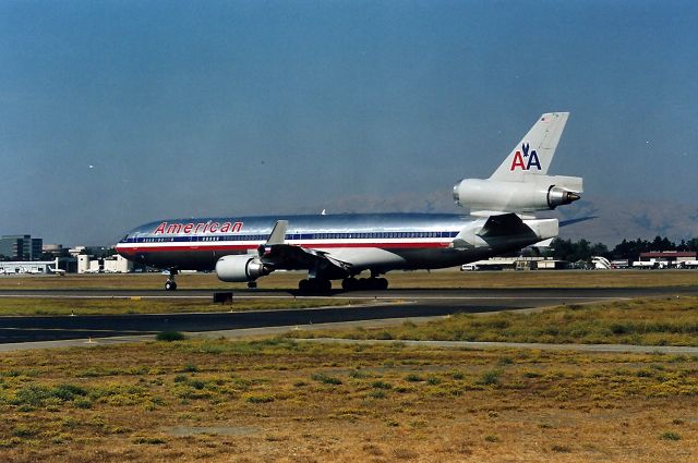 Boeing MD-11 (N1750B) - KSJC - Early 1990 s photo of a Narita bound MD-11 leaving San Jose. This flight is also leaving very late - on this day.