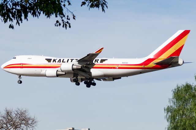 Boeing 747-400 (N403KZ) - Centered in the middle of the trees on arrival from Indianapolis 