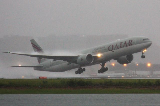 BOEING 777-300ER (A7-BEO) - This Qatar B777-300 departing in heavy rain at BOS back to JFK after diverting due to reportedly an equipment outage on 7/3/21.