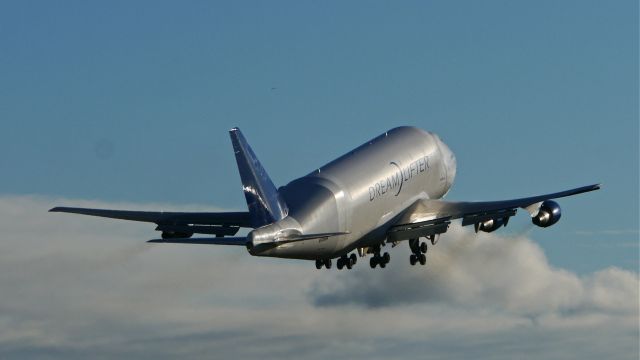 Boeing 747-400 (N718BA) - GTI4512 climbing from Rwy 16R on a flight to RJGG / NGO on 1/12/15. (ln 932 / cn 27042). The aircraft has almost turned silver in the afternoon sunshine.