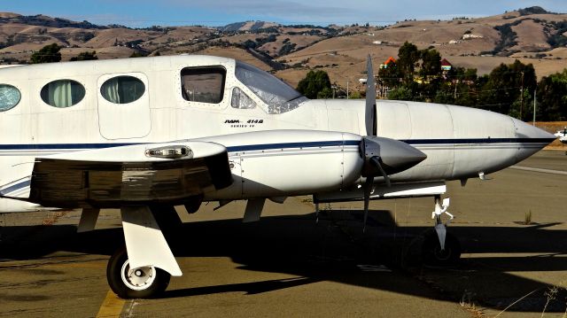 Cessna Chancellor (N121BD) - Poor Cessna 414 parked at its old tie down at Reid Hillview in summer of 2015. Somehow, it managed to fly out of here after sitting for 6 years. Its now somewhere at KSJC and soon will be ferried to Florida/Caribbean. 