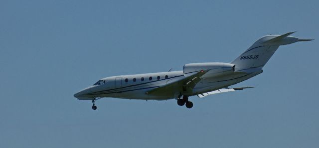 Cessna Citation X (N956JS) - About to touch down is this 2000 Cessna Citation X in the Spring of 2025.