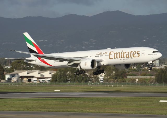 BOEING 777-300ER (A6-EBY) - EK440D arriving on Rwy.23 almost 24hrs late. The lovely winter light beaming down on this beast of an aircraft.