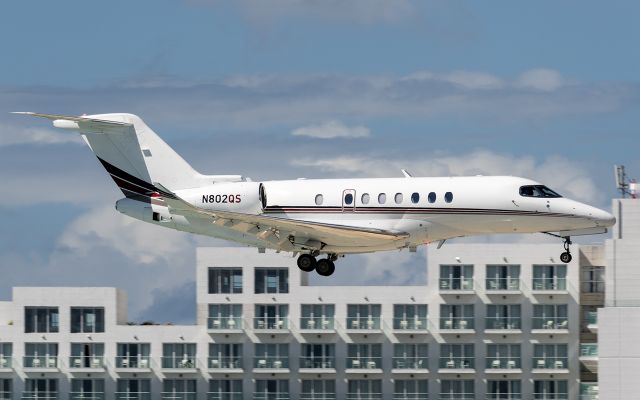 Cessna Citation Longitude (N802QS) - EJI Netjets Cessna 700 landing at SXM 24/Feb/2024
