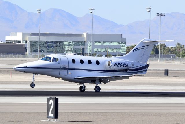 Beechcraft Premier 1 (N264DL) - N264DL 2002 RAYTHEON AIRCRAFT 390 s/n RB-27br /br /McCarran International Airport (KLAS)br /Las Vegas, Nevadabr /TDelCorobr /May 30, 2013