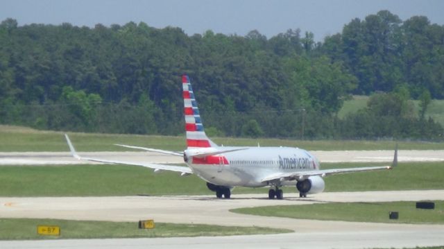 Boeing 737-800 (N830NN) - American 124 from Raleigh-Durham to Miami taxing to runway 23R.