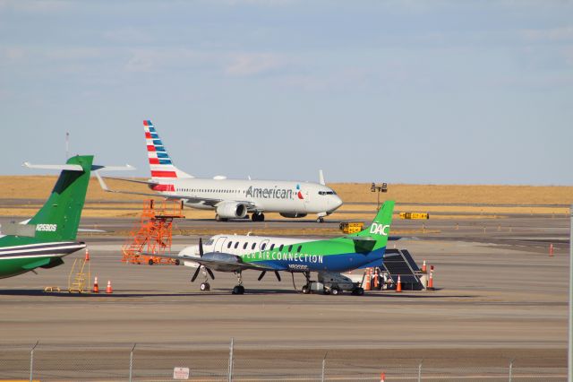 Fairchild Dornier SA-227DC Metro (N820DC) - View in full for highest quality.br /Denver Air Connection SA227DC and American 737-823 at KDEN 10/10/21