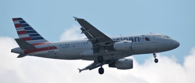 Airbus A319 (N737US) - Moments before landing, summer 2019.