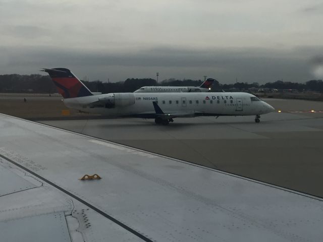 Canadair Regional Jet CRJ-200 (N854AS) - CRJ-200 departing Atlanta, GA