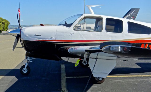 Beechcraft Bonanza (33) (N133VM) - Nicey painted Bonanza 33 visiting @ RHV.