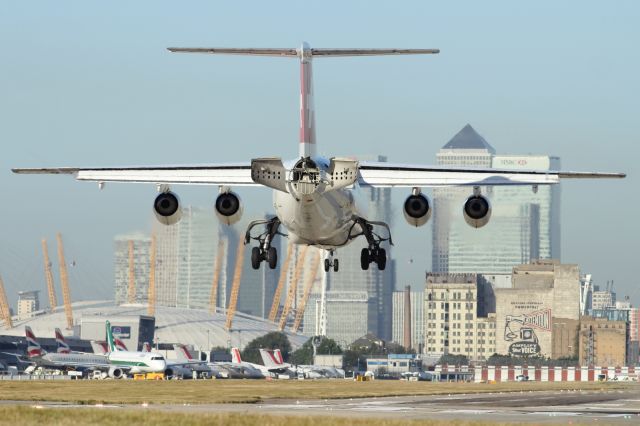 — — - Landing at London City, a Swiss BAe-146 deploys it's Air Brakes.