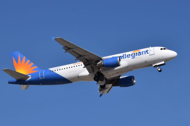 Airbus A320 (N229NV) - Allegiant A320 on the climb out from RWY 6R at KDAY