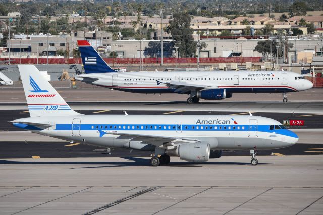 Airbus A319 (N744P) - A couple of AAL prior airline hybrids.