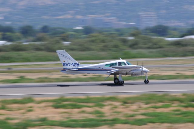 Cessna 310 (N5740M) - Taking off Runway 13 KPVU. br /Best viewed in full! 