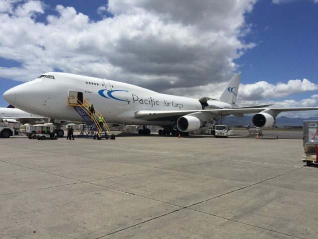 Boeing 747-200 (N703CK) - Bety Ward 1. Thursday afternoon At Honolulu. Being loaded for our flight to Los Angeles.