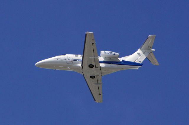 Embraer Phenom 100 (N121PZ) - Depature TNCM