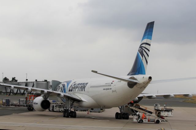 Airbus A330-300 (SU-GDS) - Egyptair (MS) SU-GDS A330-343 [cn1143]br /Paris Charles de Gaulle (CDG). Egyptair flight MS800 to Cairo (CAI) awaits departure from the gate at an overcast Paris.br /Taken from Terminal 1 arrivals level.br /2018 08 09br /a rel=nofollow href=http://alphayankee.smugmug.com/Airlines-and-Airliners-Portfolio/Airlines/MIDDLE-EAST-AFRICA/Egyptair-MS/https://alphayankee.smugmug.com/Airlines-and-Airliners-Portfolio/Airlines/MIDDLE-EAST-AFRICA/Egyptair-MS//a