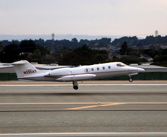 Learjet 35 (N335AT) - KMRY - This jet departed Del Monte Aviation FBO right after N549XJ - 