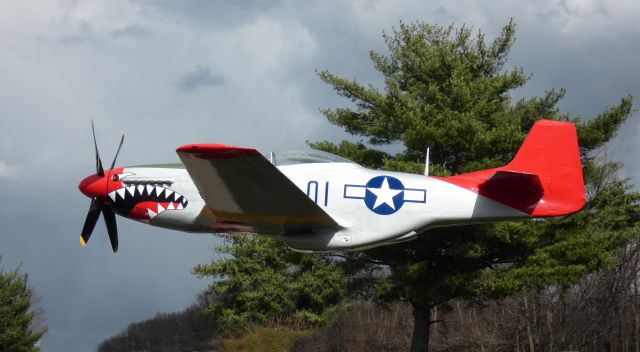 North American P-51 Mustang — - This aircraft is not airborne. There was no wheels attached. Edited out all the mounts holding it in place and unsightly electricity lines and poles. This is a North American Aviation P-51 Mustang WW II & Korean Wars fighter and bomber. There were 8 versions. This particular one is on display on someone's business property along a road I use.  No tail number or airport code for this groundcraft. Just neat to see.  