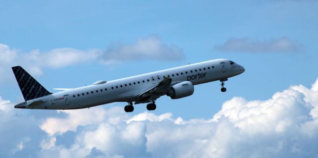 EMBRAER ERJ-190-400 (C-GZQX) - Shortly after departure is this 2023 Porter Airlines Embraer E195-E2 in the Spring of 2024.