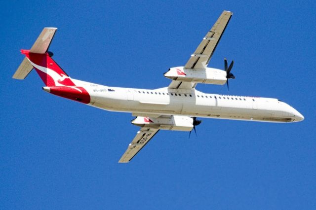 de Havilland Dash 8-400 (VH-QOS) - Heading skywards off runway 23. Thursday 4th April 2013.