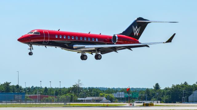 Bombardier Global 5000 (N247WE) - The WWE's Global 5000 over the numbers for runway 6 after a short flight up from HPN.br /Shot with a Nikon D3200 w/ Nikkor 70-300mmbr /Best viewed in Full Size