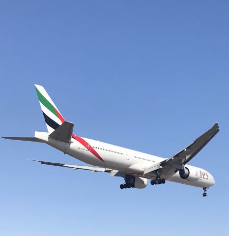 BOEING 777-300ER (A6-EGG) - Runway 1 arrival! 4/3/22.