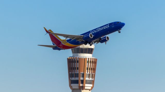 Boeing 737-800 (N8523W) - Southwest Airlines 737-800 taking off from PHX on the morning of 6/14/2022. Taken with a Canon 850D and Canon 75-300mm lens.