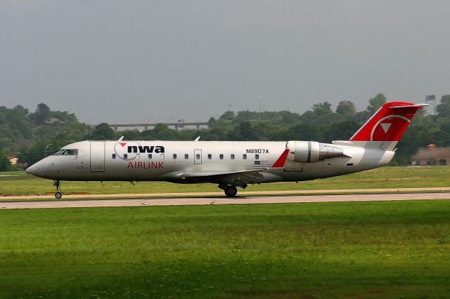 Canadair Regional Jet CRJ-200 (N8907A) - "Flagship 3748" is pictured seconds after touchdown on runway 25.