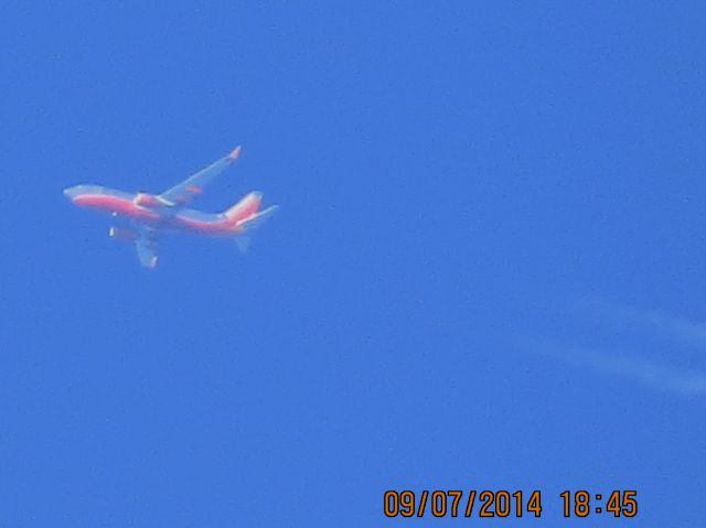 Boeing 737-700 (N7720F) - Southwest Airlines flight 3679 from ATL to DEN over Southeastern Kansas at 38k feet.