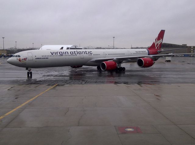 Airbus A340-600 (G-VBLU) - The Virgin 11 operated by GVBLU heads into gate E8A at KBOS