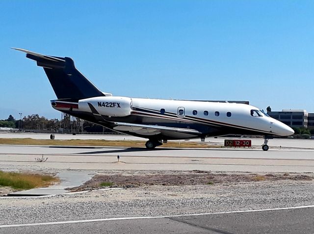 Embraer Legacy 450 (N422FX) - Taxiing to RWY 30