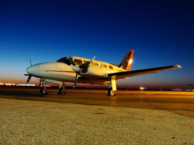 Piper Navajo (C-GRWN) - 4AM as the sun is just about to crest the horizon.