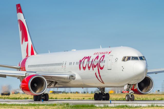 BOEING 767-300 (C-GHLV) - ROU1906 taxis to runway 06L and heads to Marco Polo Intl in Venice