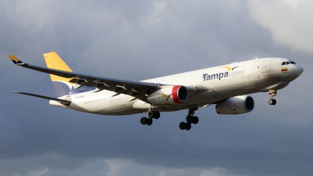 Airbus A330-200 (N330QT) - Arriving,after a rainshower!!"