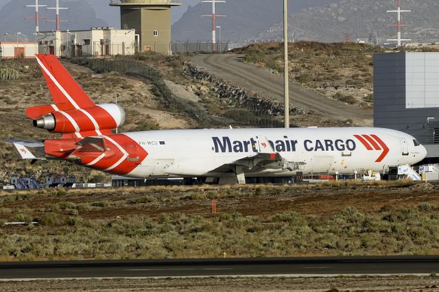 Boeing MD-11 (PH-MCU) - This MD11 airline Martinair Cargo, which originated in the Netherlands , had to return to Tenerife South ( Reina Sofia ) Airport after an explosion at one of its three engines, March 9, 2014 as information captured by unofficial routes and there is graphic evidence . The event took place at dawn yesterday, and the alarm went off a few minutes after takeoff Island bound for Sao Paulo , where the incident occurred .br /br /Despite the severity of the event, the captain of the aircraft had no trouble controlling it , favored by the small aerodrome traffic at that hour, and after an engine fire , rolled several times in the air to get rid of fuel and could take land without major problems.br /br /Specifically , the plane is a Boeing MD- 11F and carrying in its hold several horses whose fate was an international event and various materials.